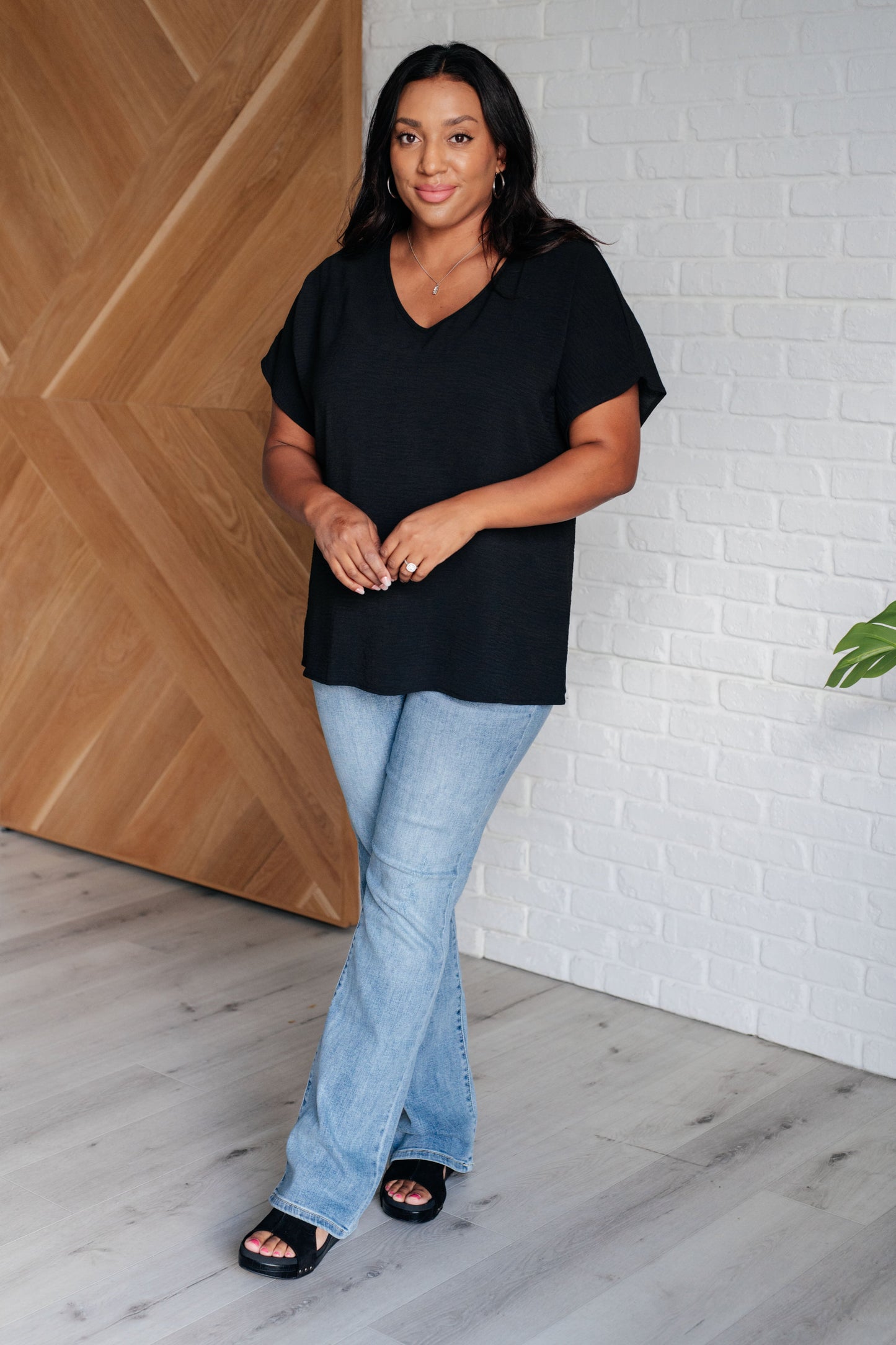 Frequently Asked Questions V-Neck Top in Black -DS